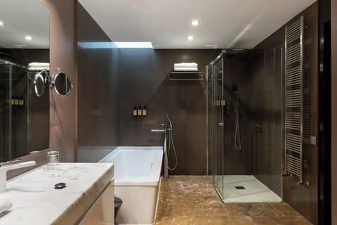 Deep soaking tub, eco-friendly toiletries, hair dryer, bidet