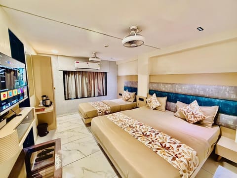Family Double or Twin Room, 1 Bedroom, City View | Soundproofing, iron/ironing board, bed sheets