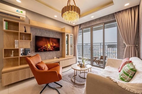 Apartment, City View | Living area | 55-inch LED TV with cable channels