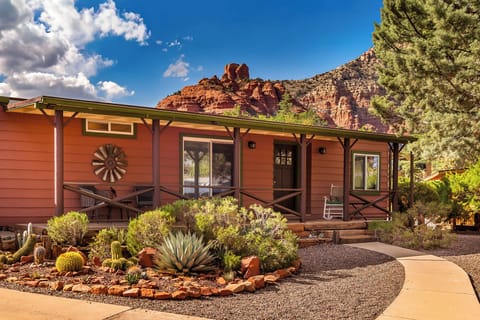 Rustic Southwest home surrounded by stunning red rock scenery.