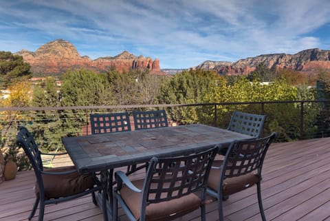 Outdoor dining on the back deck—savor meals al fresco with stunning views.