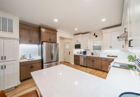 Well Equipped Kitchen with Stainless Steel Appliances