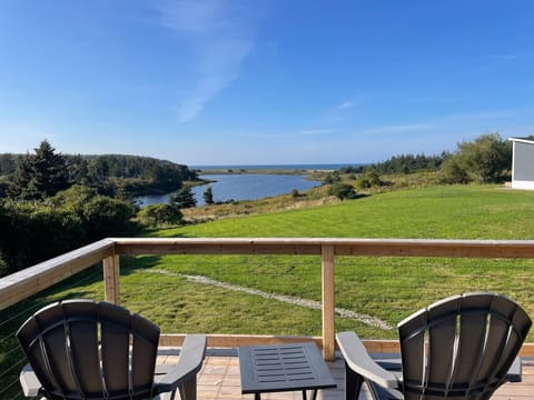 Enjoy morning coffee or a glass of wine with a great ocean view from the deck