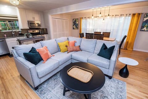 Open concept living area that overlooks the full fenced backyard.