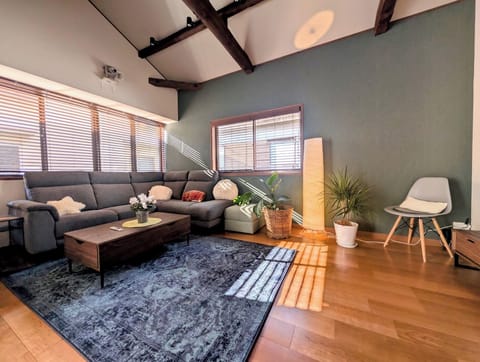 Bright living room. you will enjoy a big projector monitor.