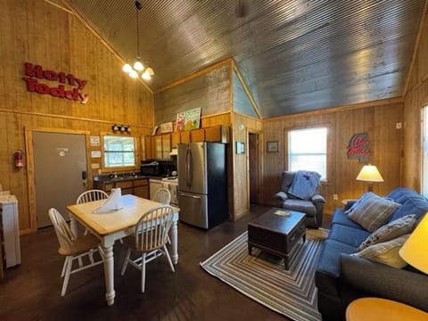 Fully stocked kitchen and living room with sleeper sofa