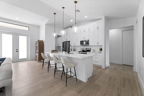 Fully stocked kitchen with seating for everyone and room to cook together