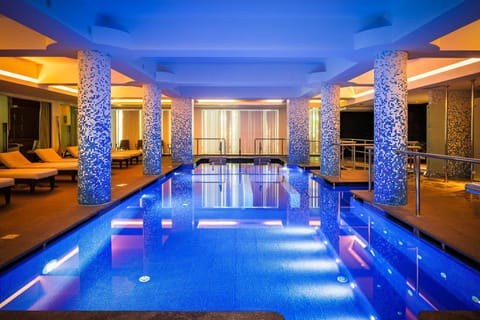 Indoor pool, outdoor pool, open 9:00 AM to 7:00 PM, pool umbrellas