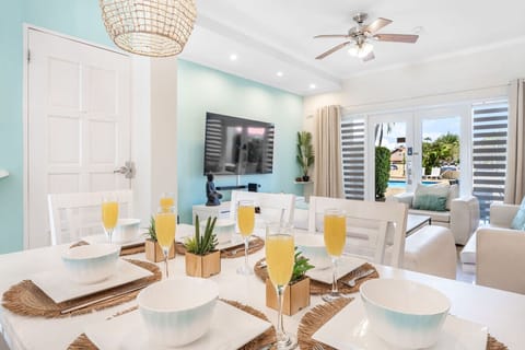 The dining space comfortably seats six for easy, enjoyable meals. A simple and cozy place to unwind together.
