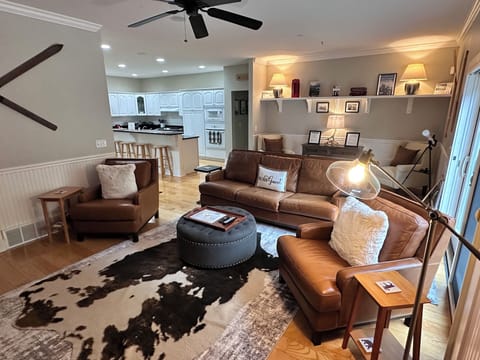 Living room, reading area and kitchen.