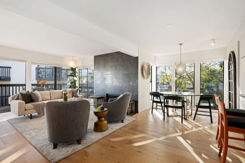 Bright windows offer glowing light into open living area