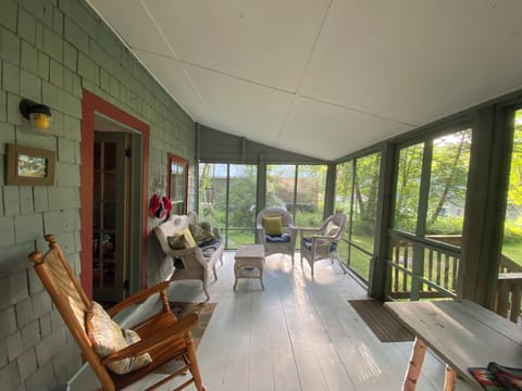 The expansive porch sets our camp apart!