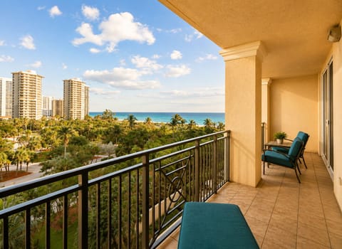 Spacious balcony with lounge seating and beautiful ocean views