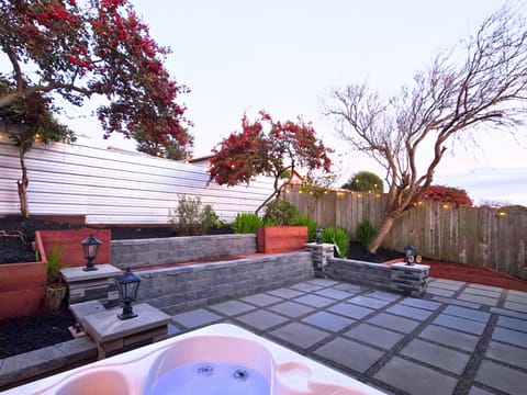 Relax and unwind with a glass of wine in the new hot tub.