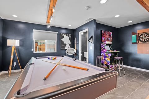 Let the games begin! Pool, darts, and fun for everyone.