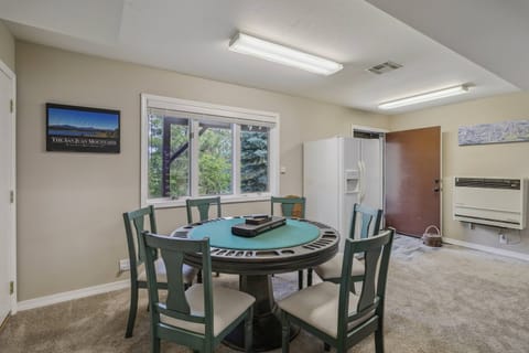 Game room is located on the lower level w/ walkout patio, golfing is just down the block! Forested views and space to play,Welcome to Pagosa!