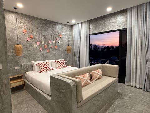 Superior Double Room, Balcony, Partial Ocean View | Minibar, in-room safe, desk, laptop workspace