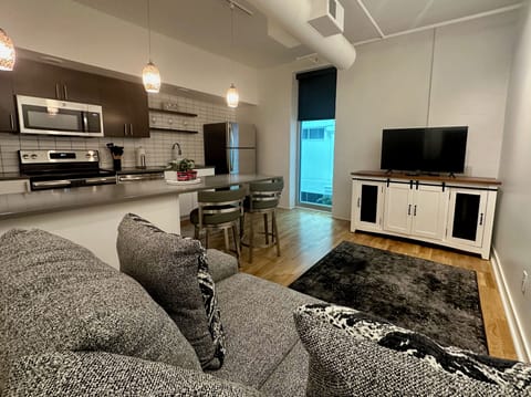 Primary living room space and kitchen