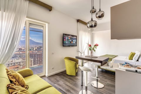 Comfort Apartment, Balcony, City View | Living area | TV
