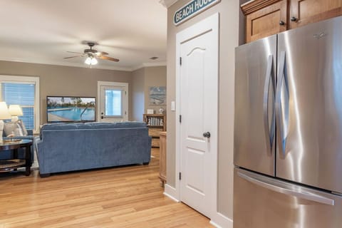 Kitchen - The fully stocked kitchen features stainless appliances and all items needed for heating, cooking and preparing meals during your stay.