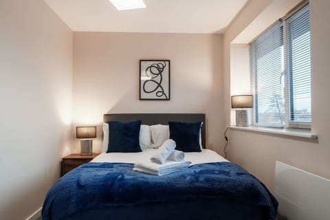 Your tranquil bedroom retreat, with wardrobe storage for added convenience and nearby access to the dining space.