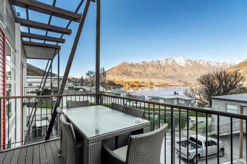 Take in the breathtaking mountain and lake views from the deck.
