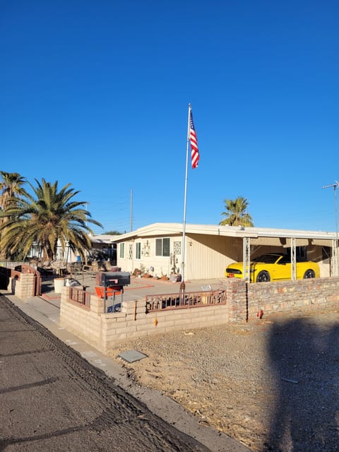 Front door leads into the Arizona room,  & half the length of the residence 