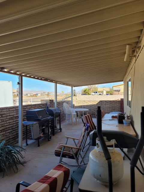 privacy patio overlooking the Gila mountains. charcoal or gas barbecues, tables