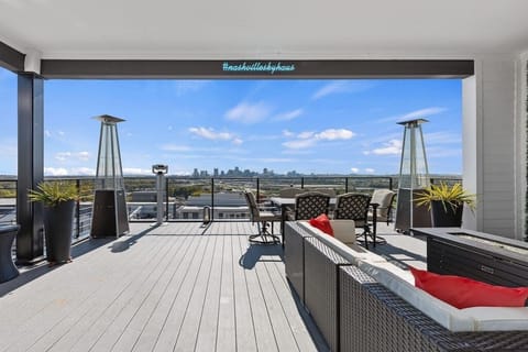 Rooftop floor has a full bath, elevator access, kitchenette, daybed with pullout trundle bed (sized XL twin).

4th floor outdoor roof-deck is half covered with an 85" flatscreen TV, fire pit, 2 heaters, electric smoker, dining room, & view finder.
