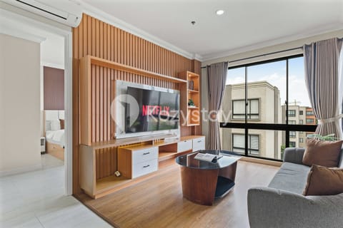 Apartment, 3 Bedrooms, Balcony, City View | Living area | Flat-screen TV