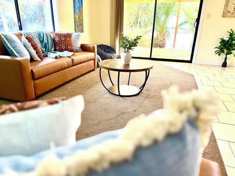 3-seater and 2-seater sofas with a large TV and climate-controlled air conditioning create a homely atmosphere for movie nights or chilled afternoons.
