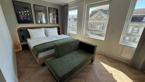 In-room safe, laptop workspace, blackout drapes, soundproofing