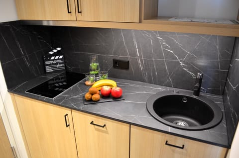 Comfort Studio, Courtyard View | Private kitchen | Coffee/tea maker, highchair