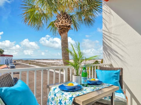 Sip morning coffee on your private balcony while soaking in stunning gulf views, swaying palms, and azure skies.