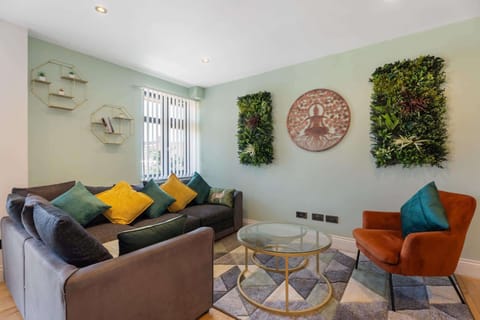 Bright open-plan living area with beautiful decor, thoughtfully designed to create a warm, stylish and inviting space for relaxing and spending quality time together