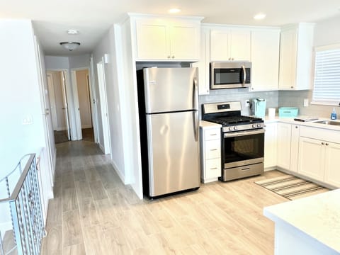 Upstairs kitchen, hallway bathroom and 3 bedrooms.