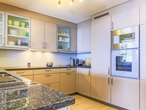 Kitchen, Kitchen Appliance, Countertop, Cabinetry, Interior Design, Major Appliance, Flooring, Cupboard, Drawer, Home Appliance