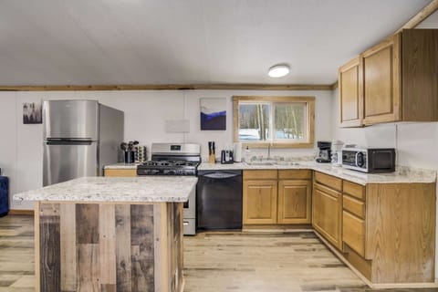 This fully equipped kitchen features modern appliances, ample counter space, and all the essentials needed to prepare delicious meals during your stay.