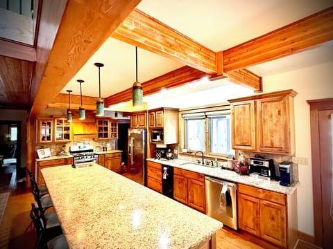 This spacious kitchen has all you need from spices to bake and cookware.
