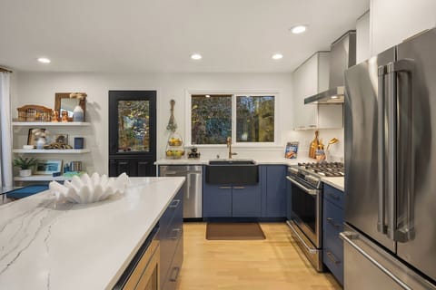 GE Cafe appliances. Gas stove. Fridge has interior water filter 