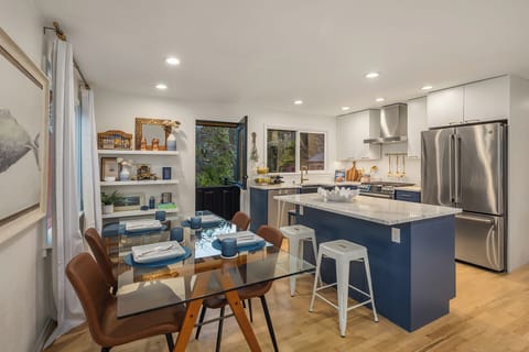 Floating shelves in dining room make home to cook books, Tacoma trinkets & goods