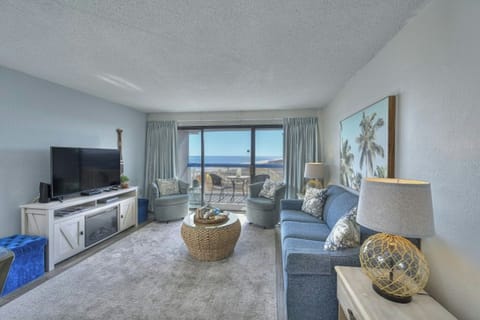 The ocean view living room is fabulous for movie night with the family.