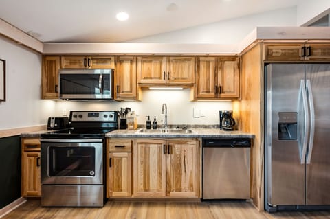 Kitchen comes with a coffeemaker, toaster, and all essential kitchen utensils.