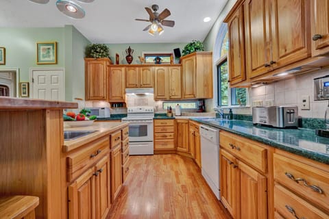 Spacious open-concept kitchen with island and ample counterspace.