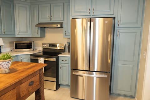 new refrigerator with ice maker and water inside the door