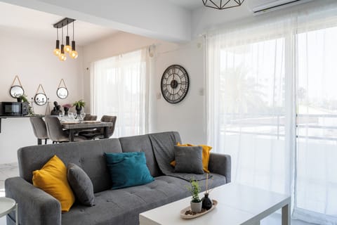 Apartment, 3 Bedrooms, Balcony, City View | Living area | 42-inch Smart TV with digital channels, streaming services