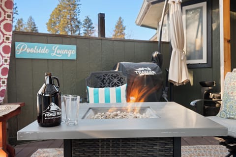 Cozy up with a blanket, close outdoor curtains, and relax by the fireplace.