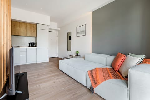 Apartment, 1 Bedroom, Balcony, City View | Living room | 42-inch Smart TV with digital channels, streaming services