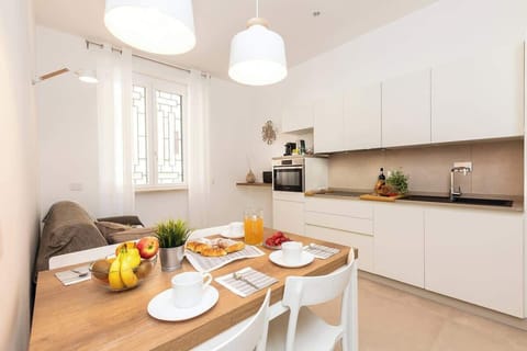 Comfortable living room with modern open kitchen