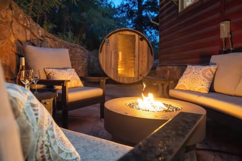 This outdoor space is calling your name! from the sauna to the firepit, you have the perfect relaxing evening right here.